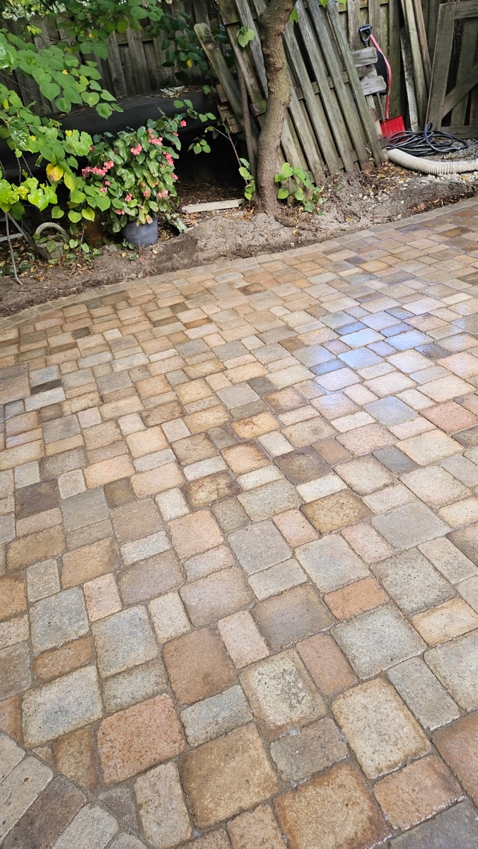 Professional retaining wall and paver patio installation by XXX Landscape