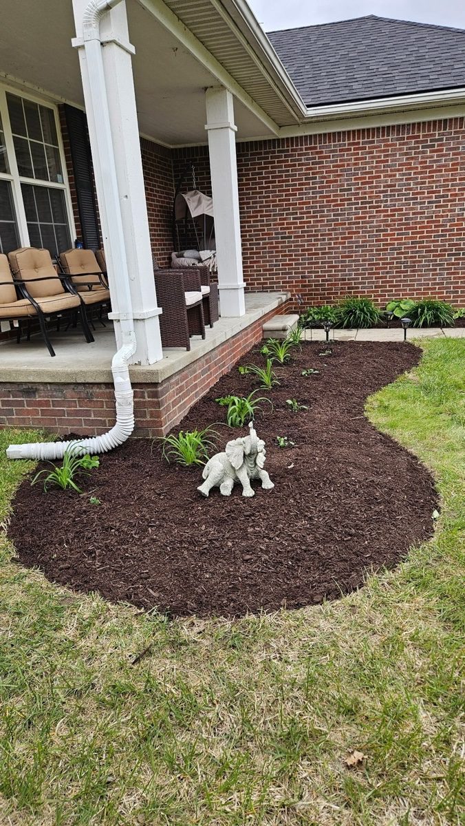 Completed planting bed installation by XXX Landscape